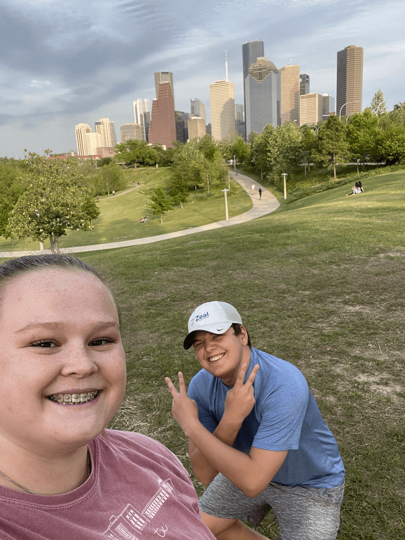 Brandon and Madison infront of downtown houston, texas